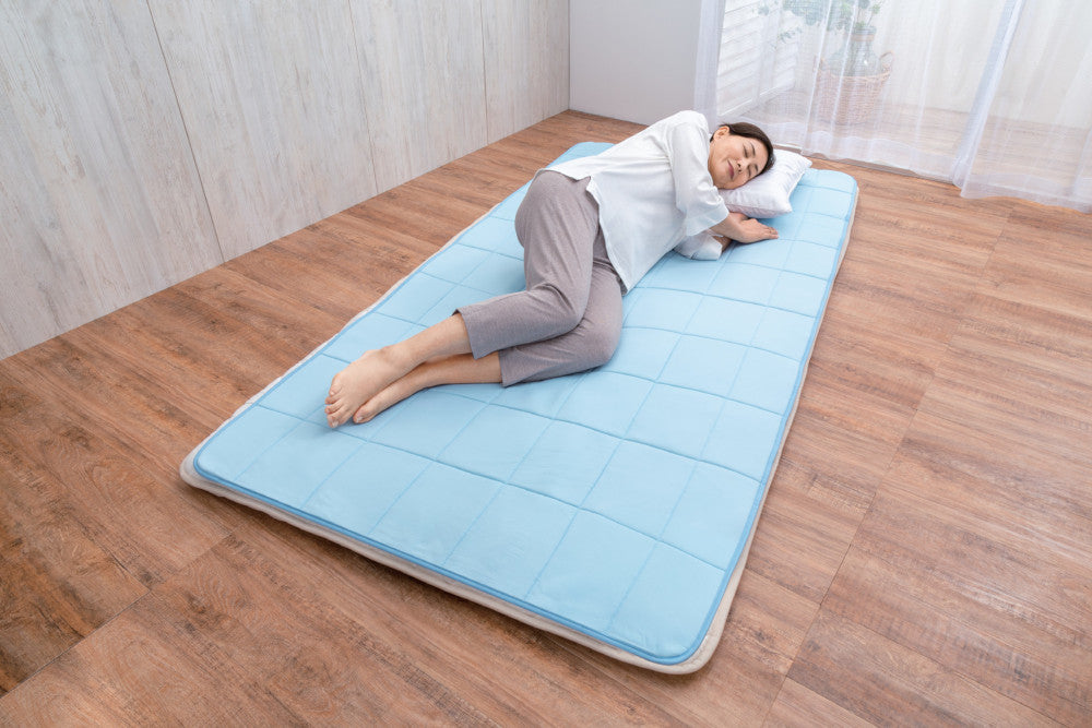 Three-layer cooling mat recommended by a chiropractor