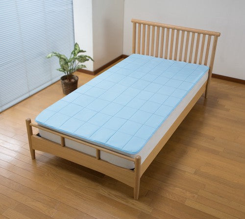 Three-layer cooling mat recommended by a chiropractor