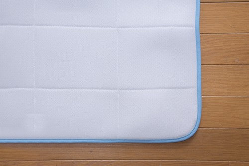 Three-layer cooling mat recommended by a chiropractor